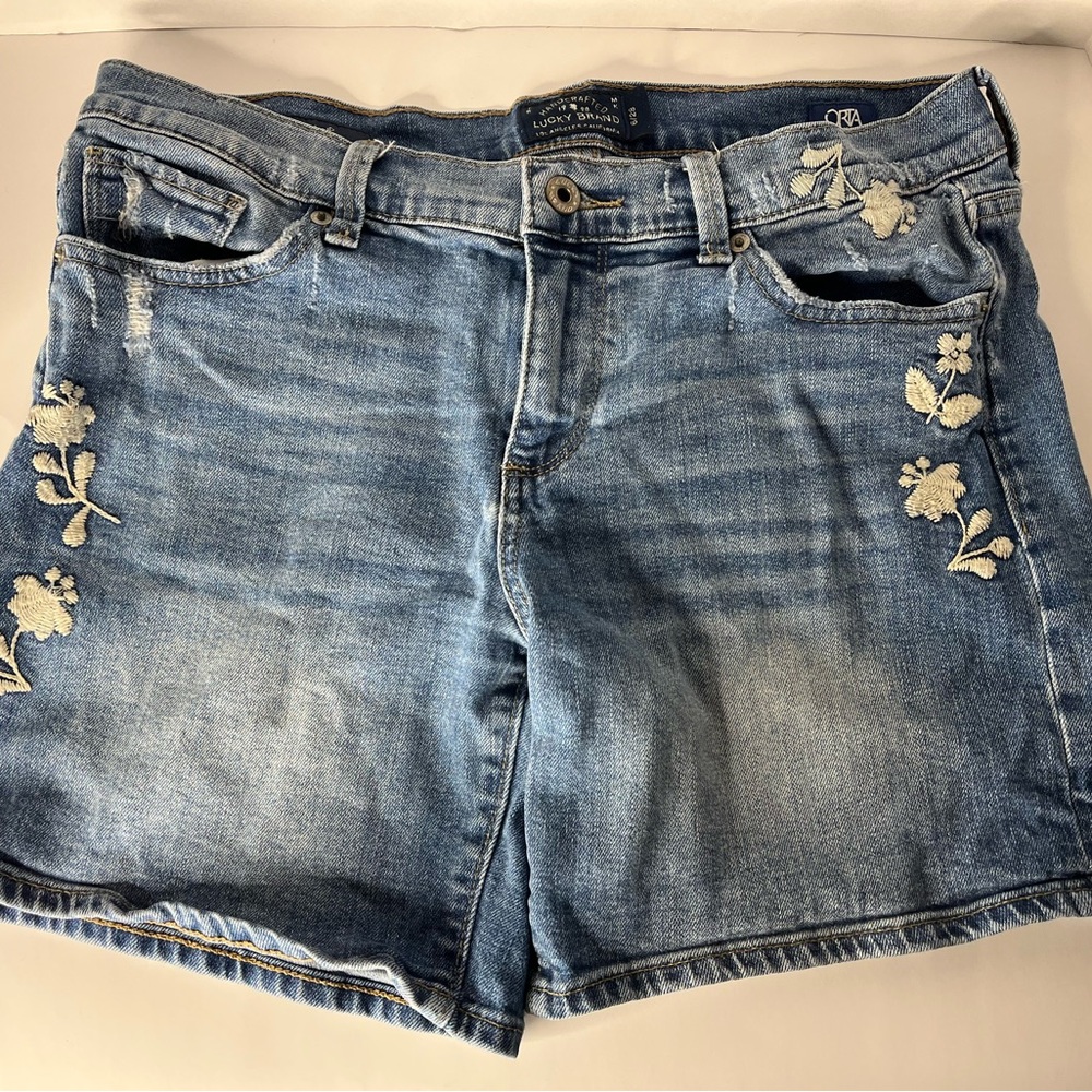 Lucky brand denim shorts. RtA Light Blue Jean Shorts with White Floral Details.